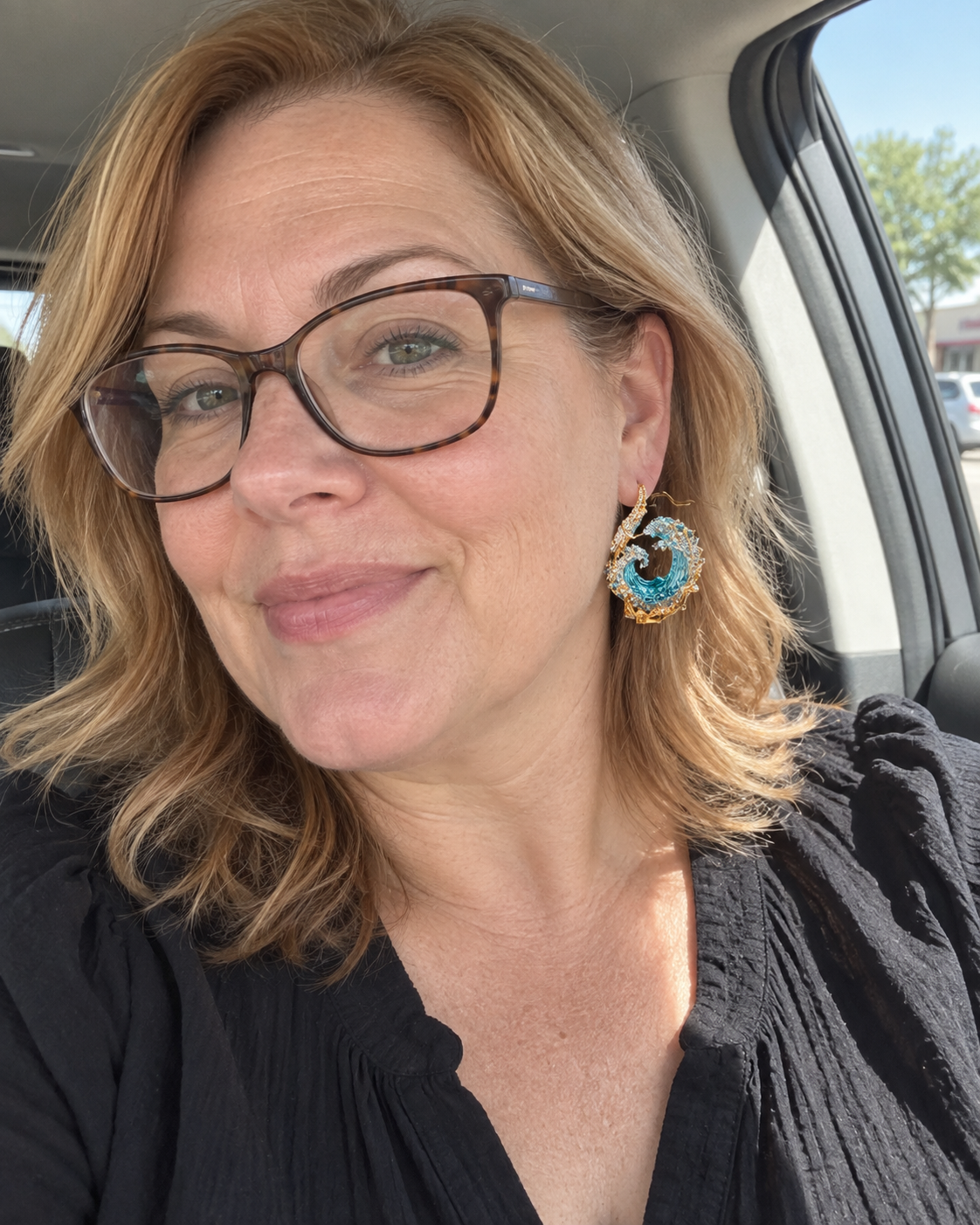 Customer-style photo wearing Ocean State Earrings